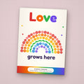 Love Grows Here Rainbow seed packet favor, front